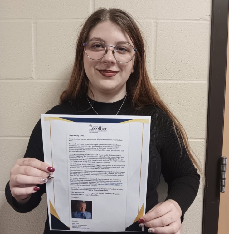 student with acceptance letter