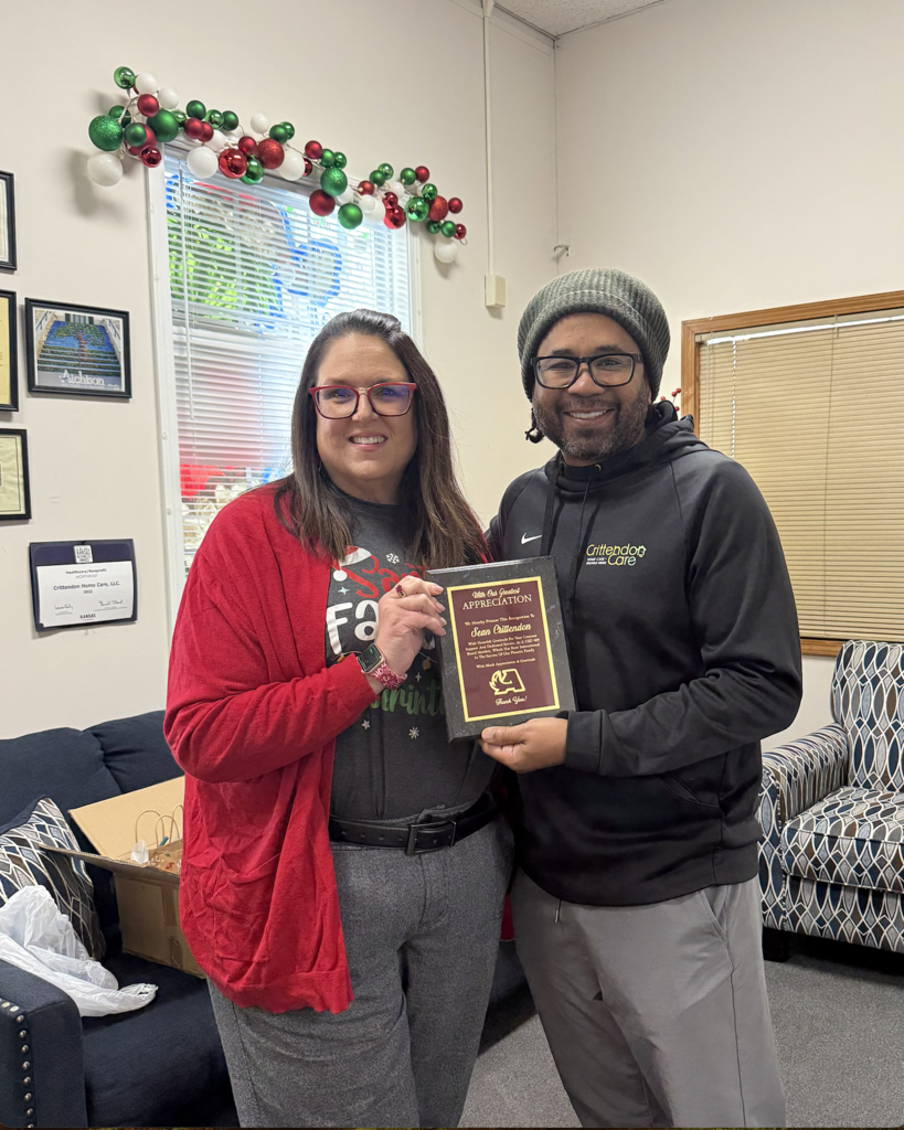 Sean Crittendon receiving an award