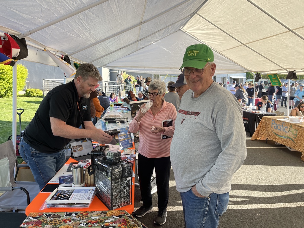 community members at a booth