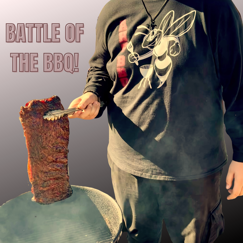 Photo shows torso and arms of a teen boy holding a slab of beef using tongs over a grill. The words "Battle of the BBQ!" also appear. His face is not shown.