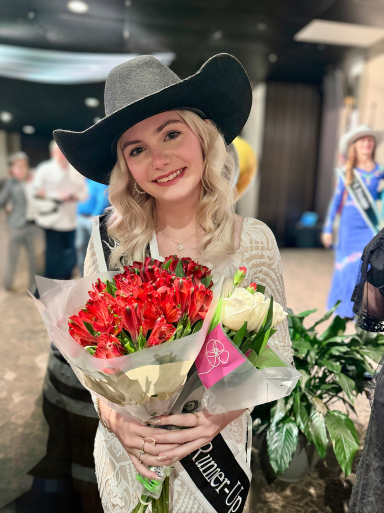 Photograph of Kennedy Ard wearing a formal gown, holding red flowers, wearing a black cowboy hat. Her says reads in part: Runner-Up