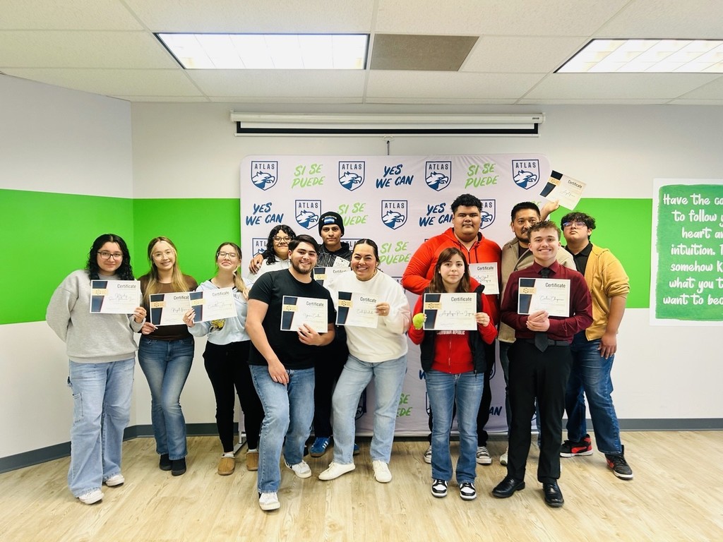 students and teachers smile