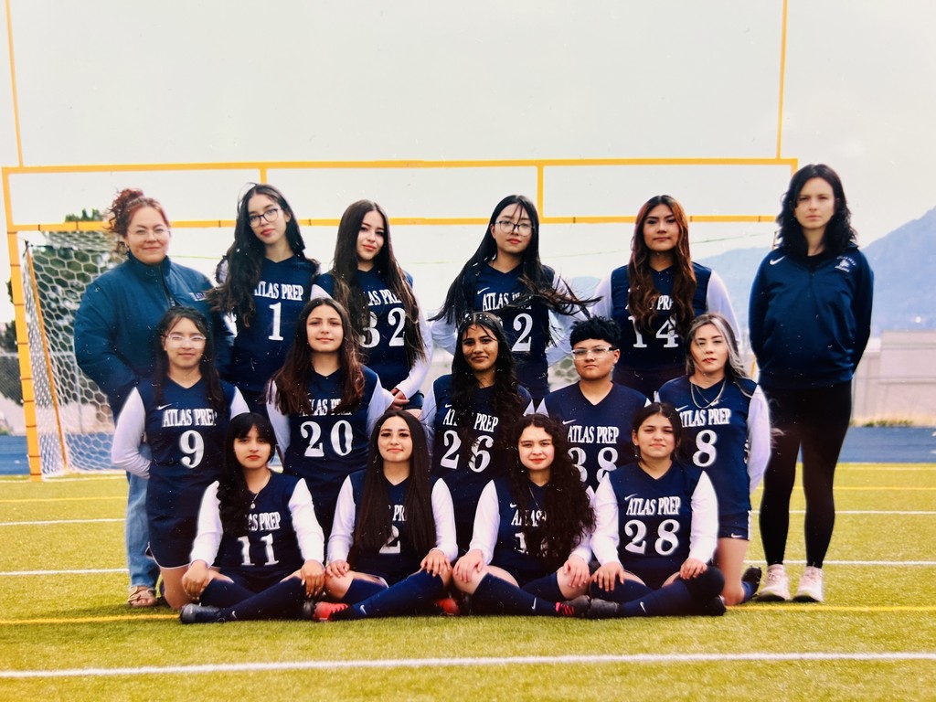 girls soccer team and coaches