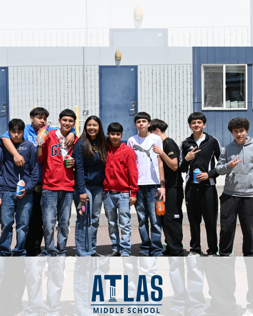 Students smile with teacher