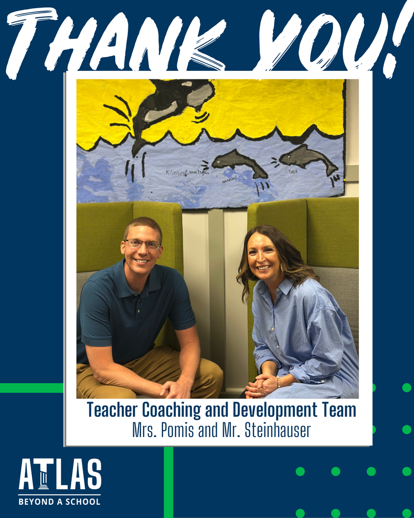Two teachers smile