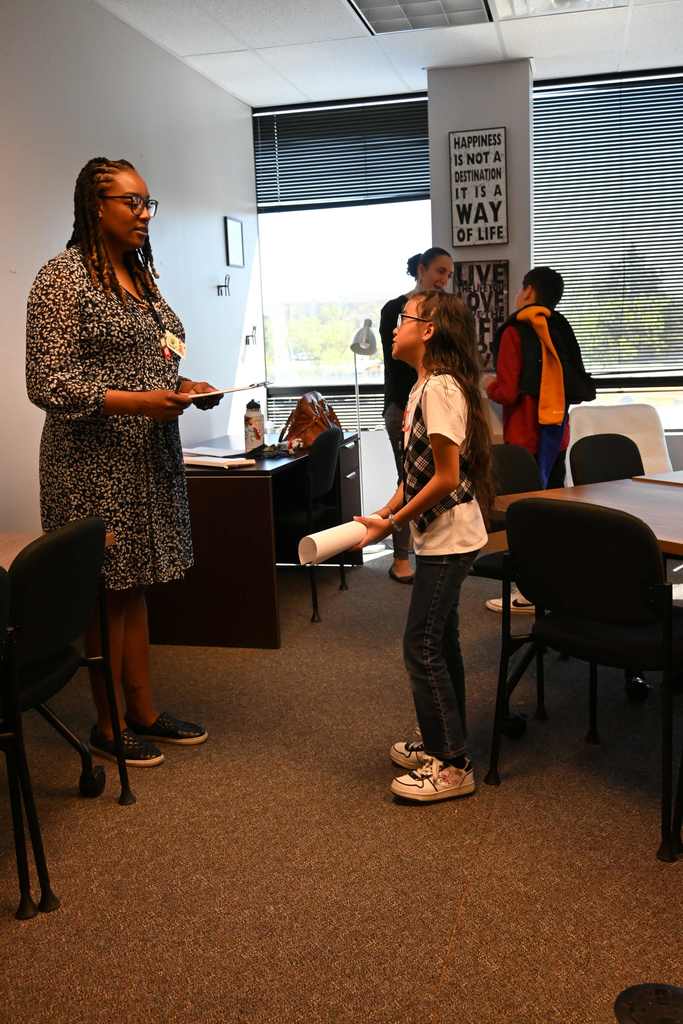 student talks with professional