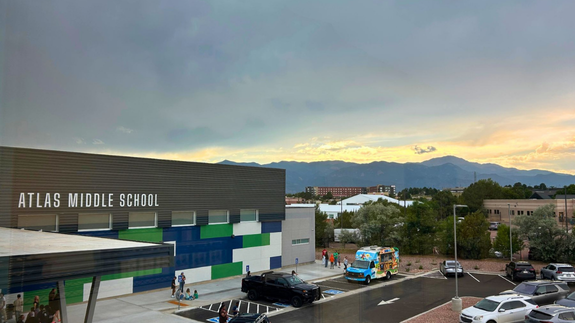 outside of school wth mountains in the background