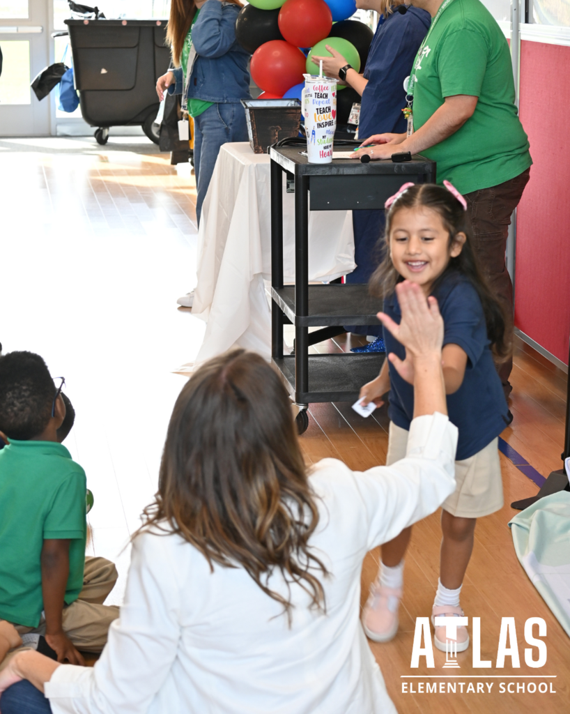 principal high-fives student
