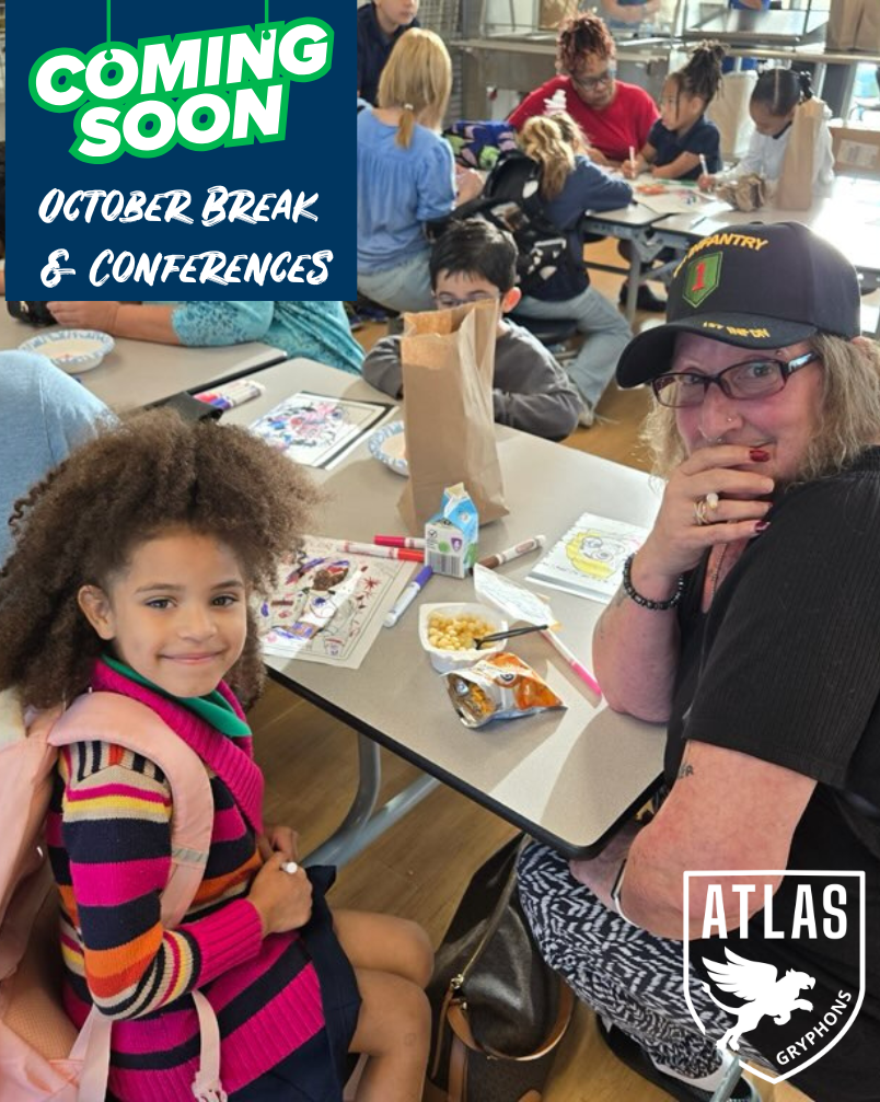 student smiles with parent