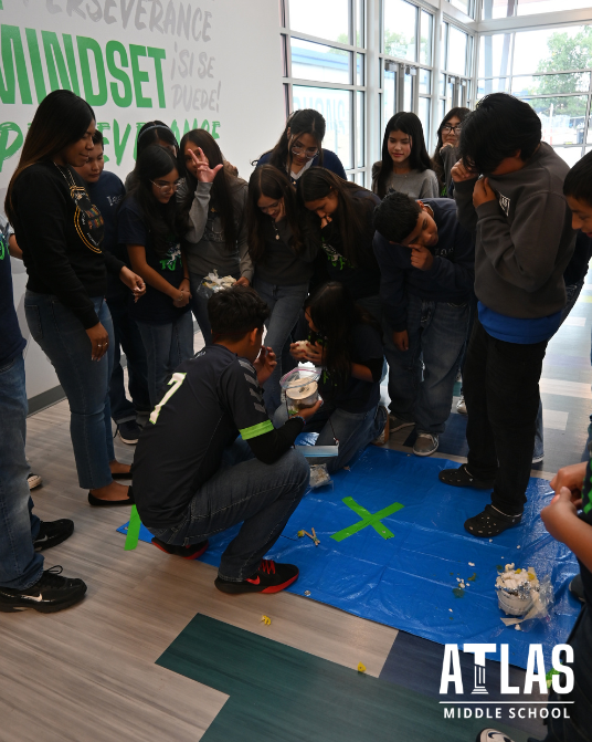 students smile in hallway