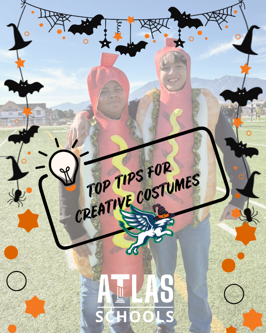 two boys stand with hot dogs on