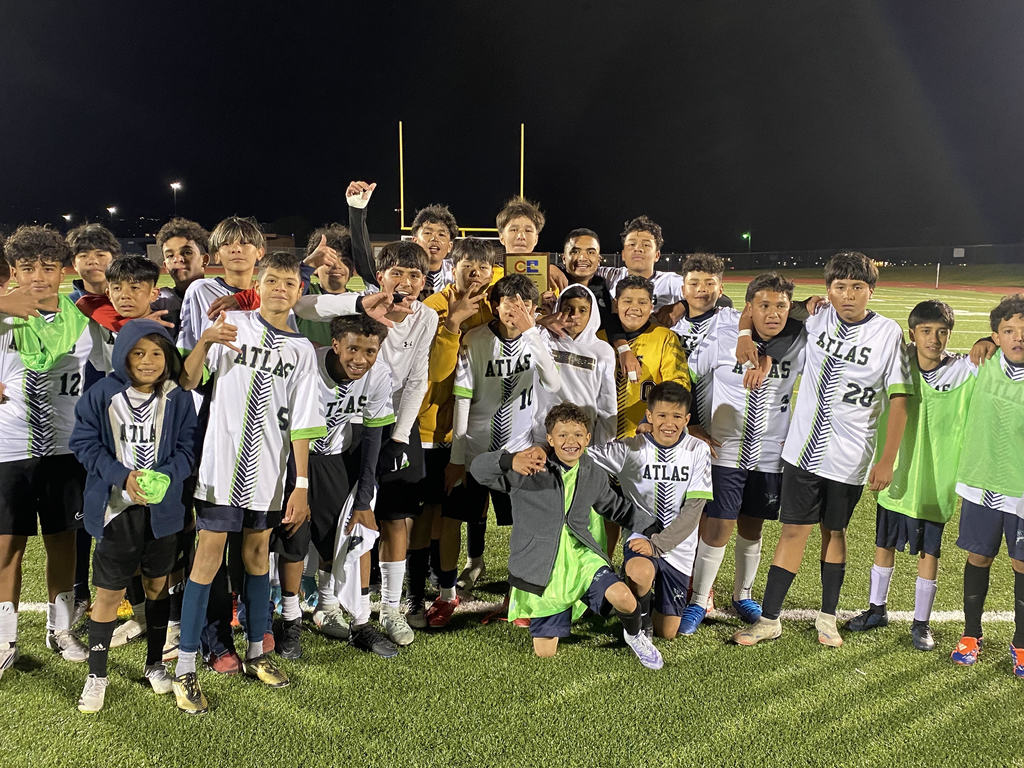 middle school soccer boys are champions