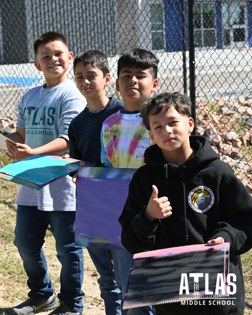 student uses spray paint