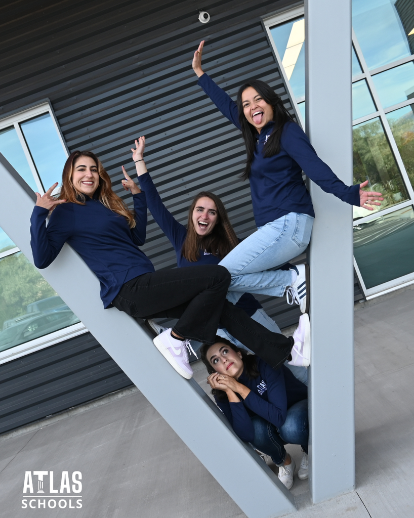 4 women pose ina silly way