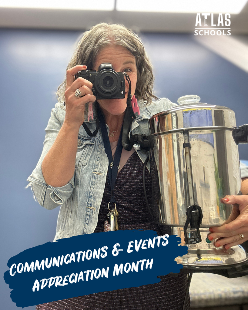 woman holding camera and coffee pot