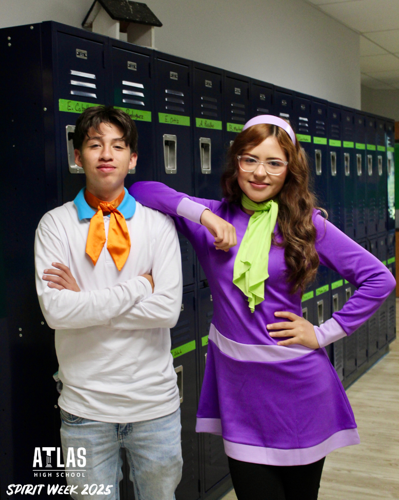 students smile in costume