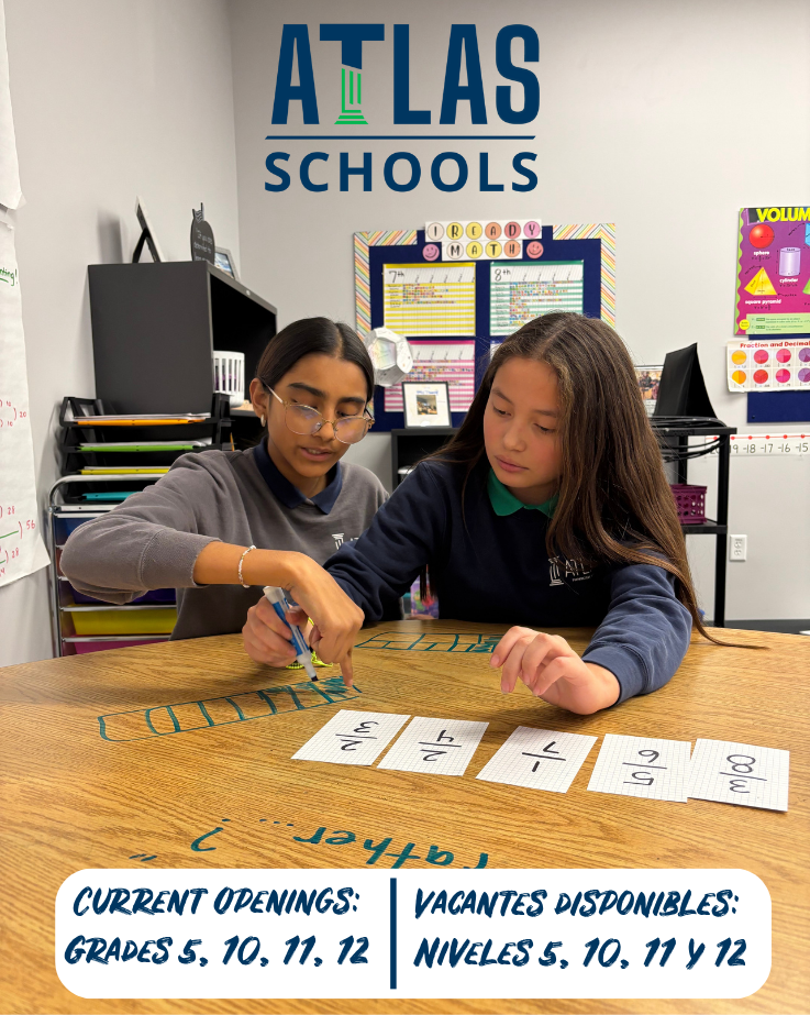 Two students work on a math problem.