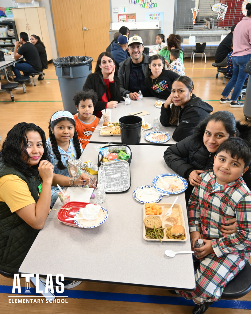 families enjoying pie with their students
