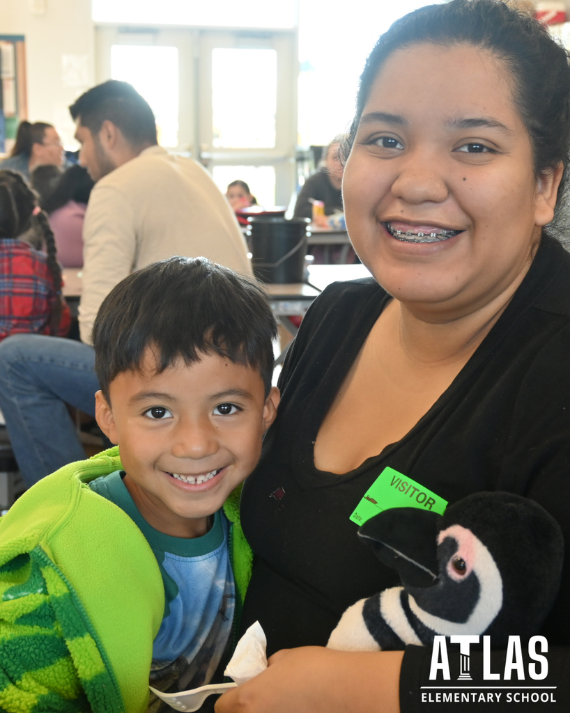 families enjoying pie with their students