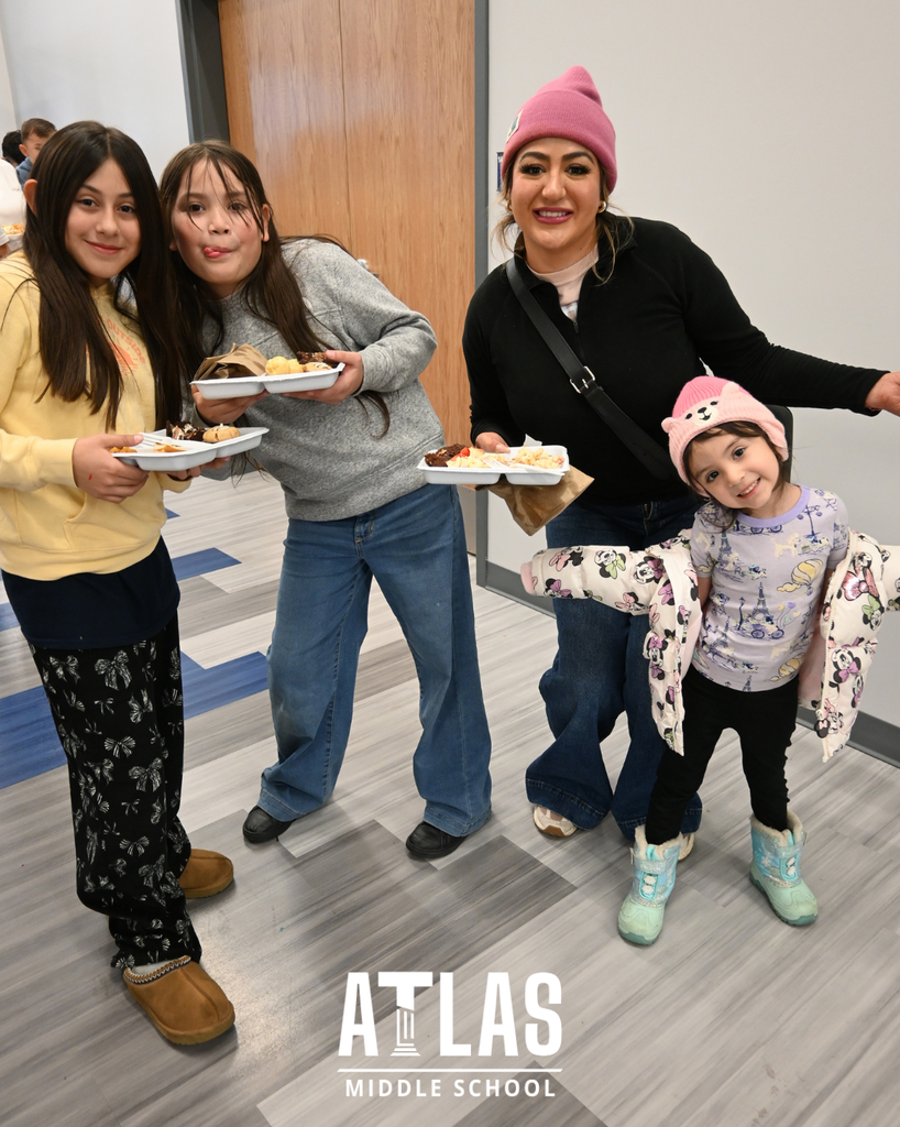 families enjoy the potluck