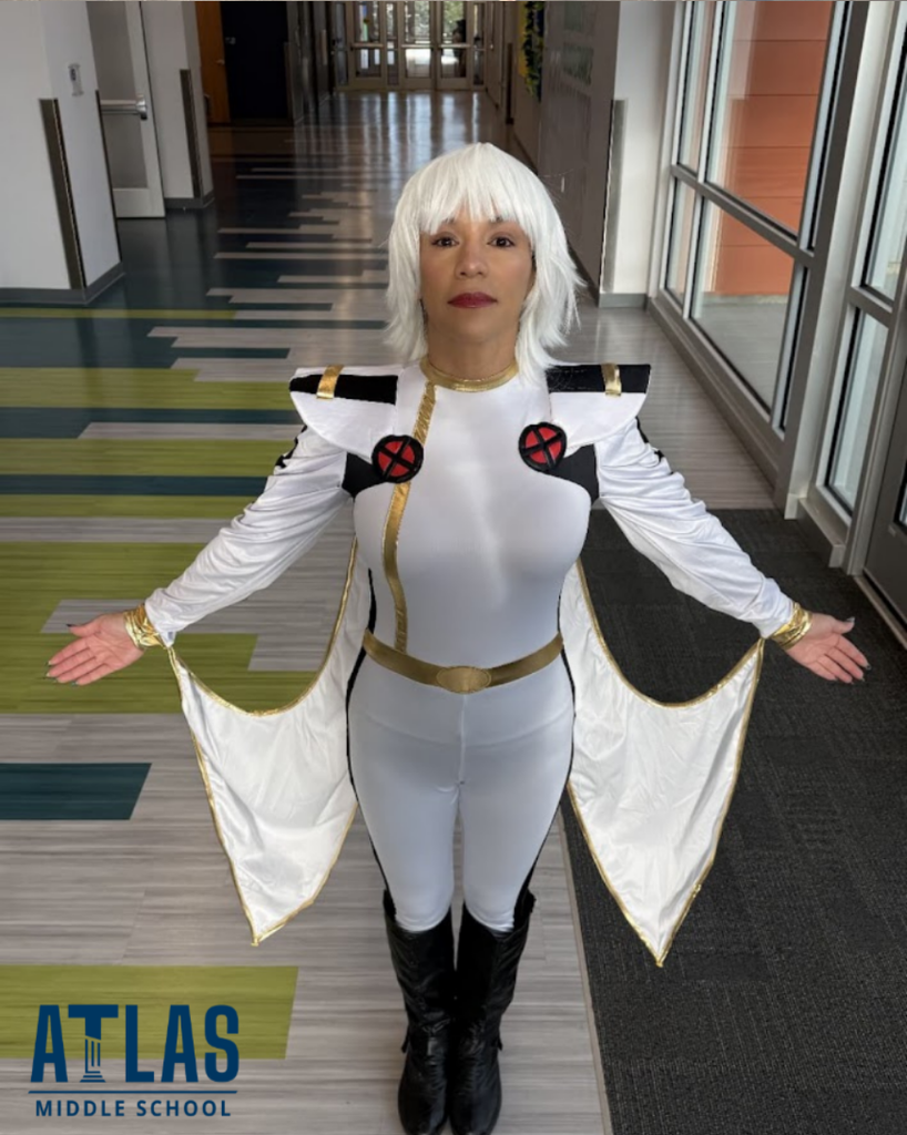 student smiles in costume