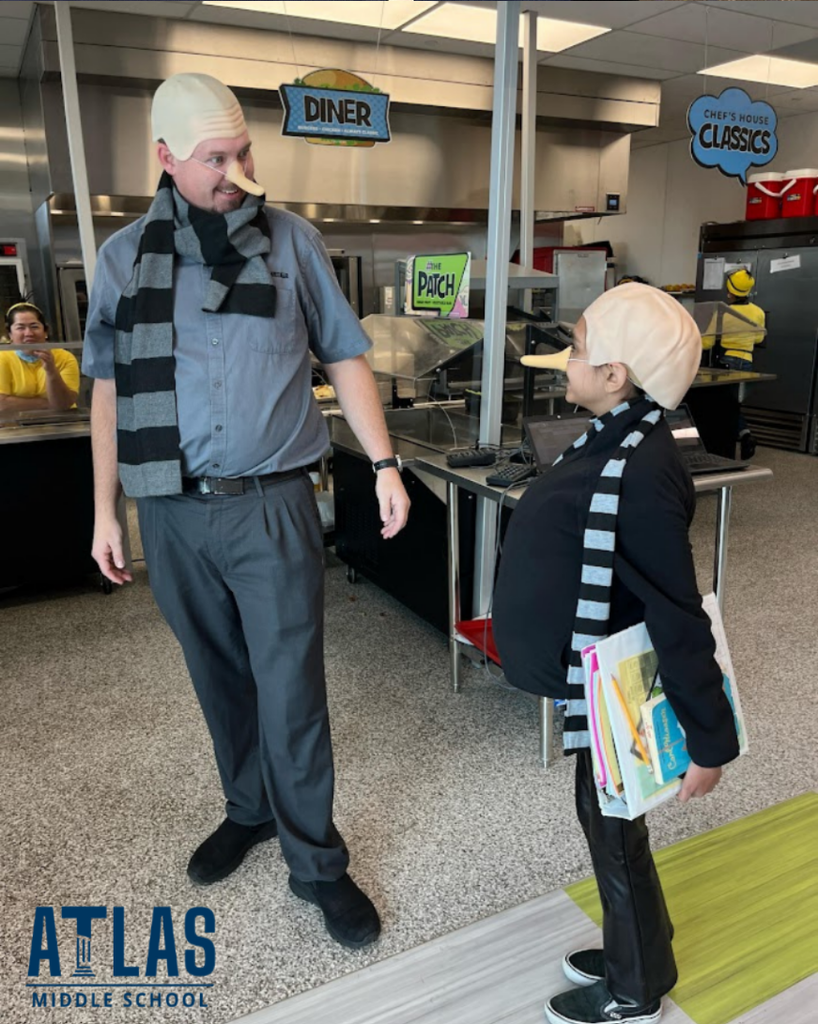 student smiles in costume