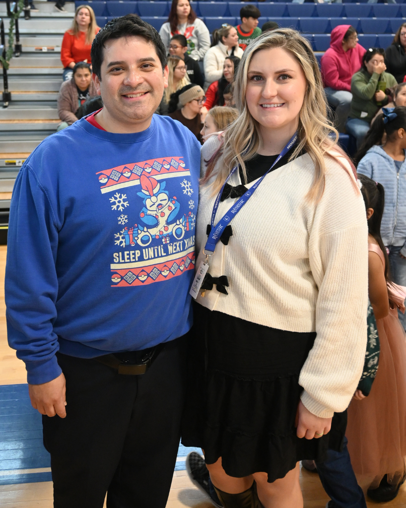 leaders Mr. Pizana and Ms. Park smile
