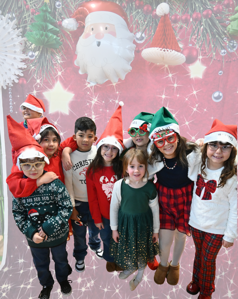 students smile while singing in holiday attire