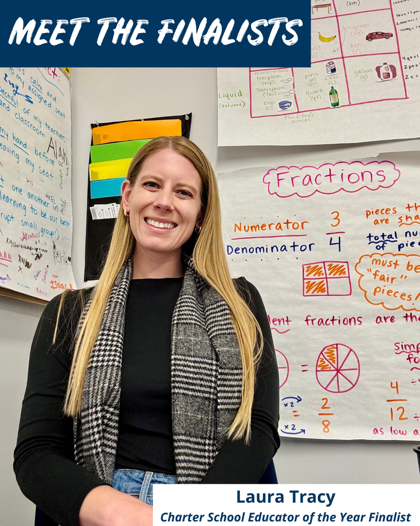 Laura Tracy, charter school educator of the year finalist, smiles with fraction posters behind her