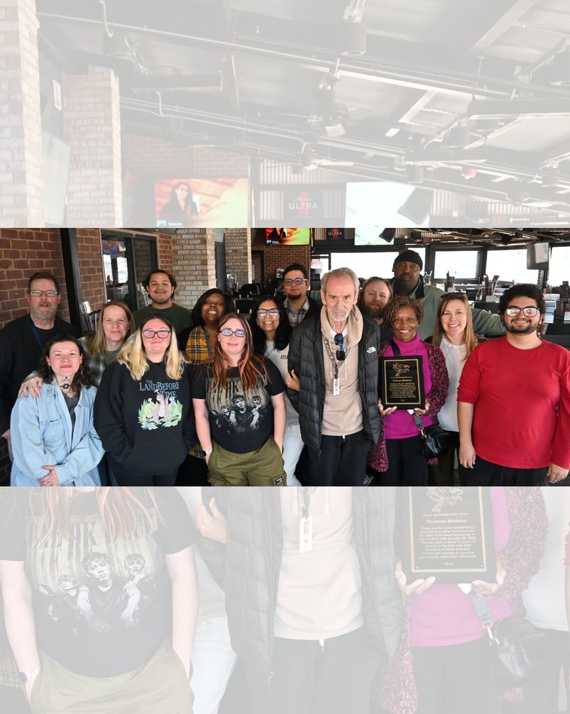 Group smiles with Tom