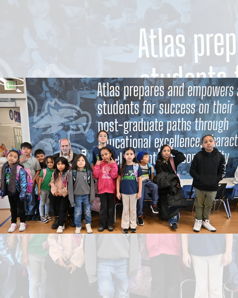 students smile with Tom