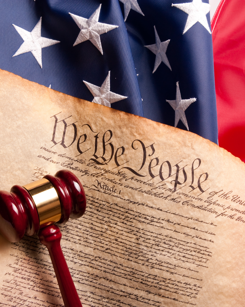 constitution We the people, gavel and us flag