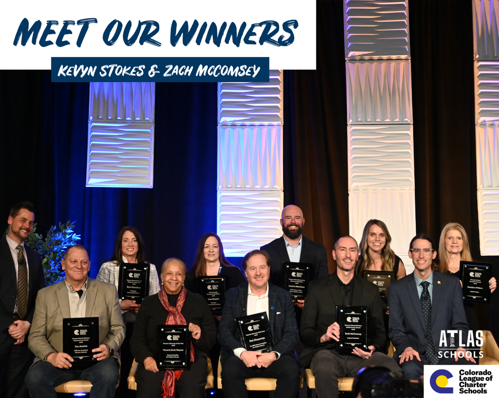 winners sit in crowd