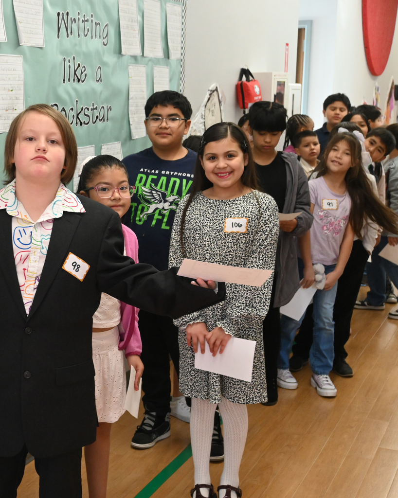student smiles with community member