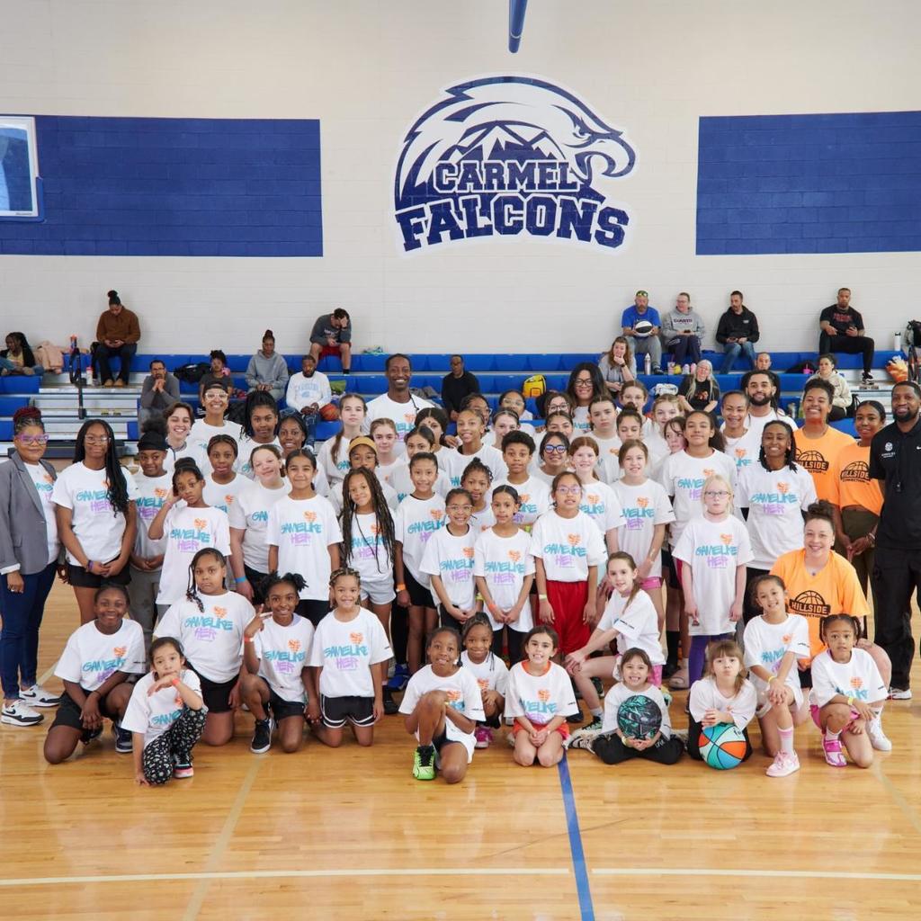 students smile in gym