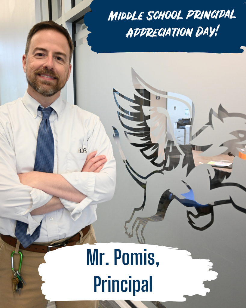 Middle school principal appreciation day! smiling man with tie and crossed arms next to a gryphon