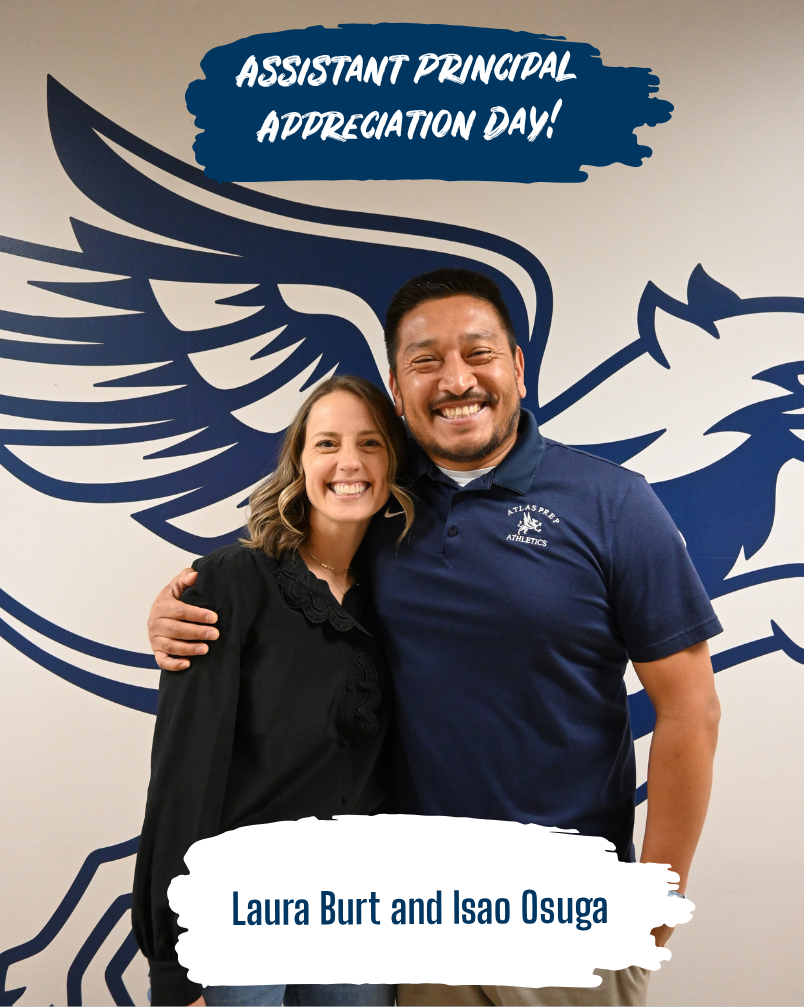 Two adults smile for assistant principal appreciation day at the high school