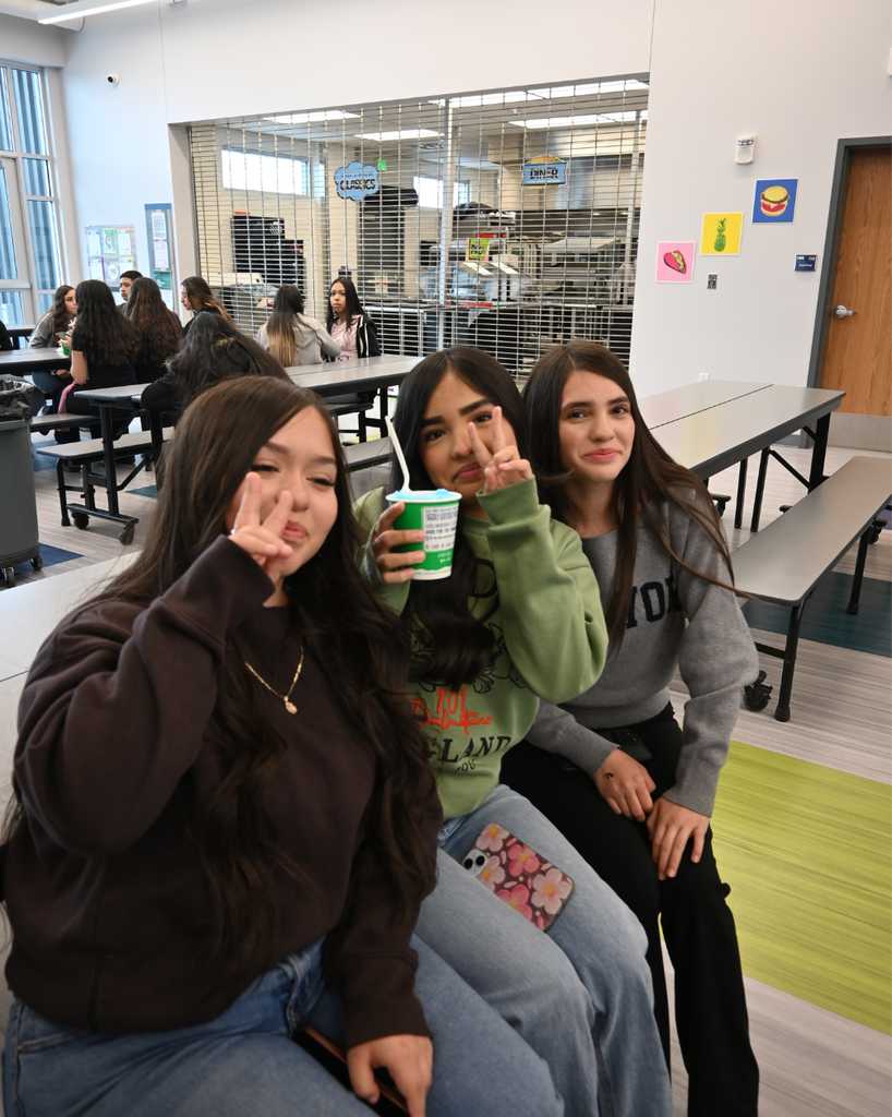 students smile with kona ice