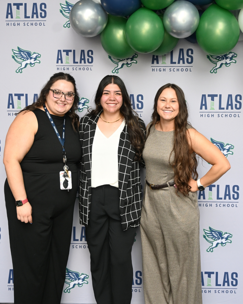 three adult women smile