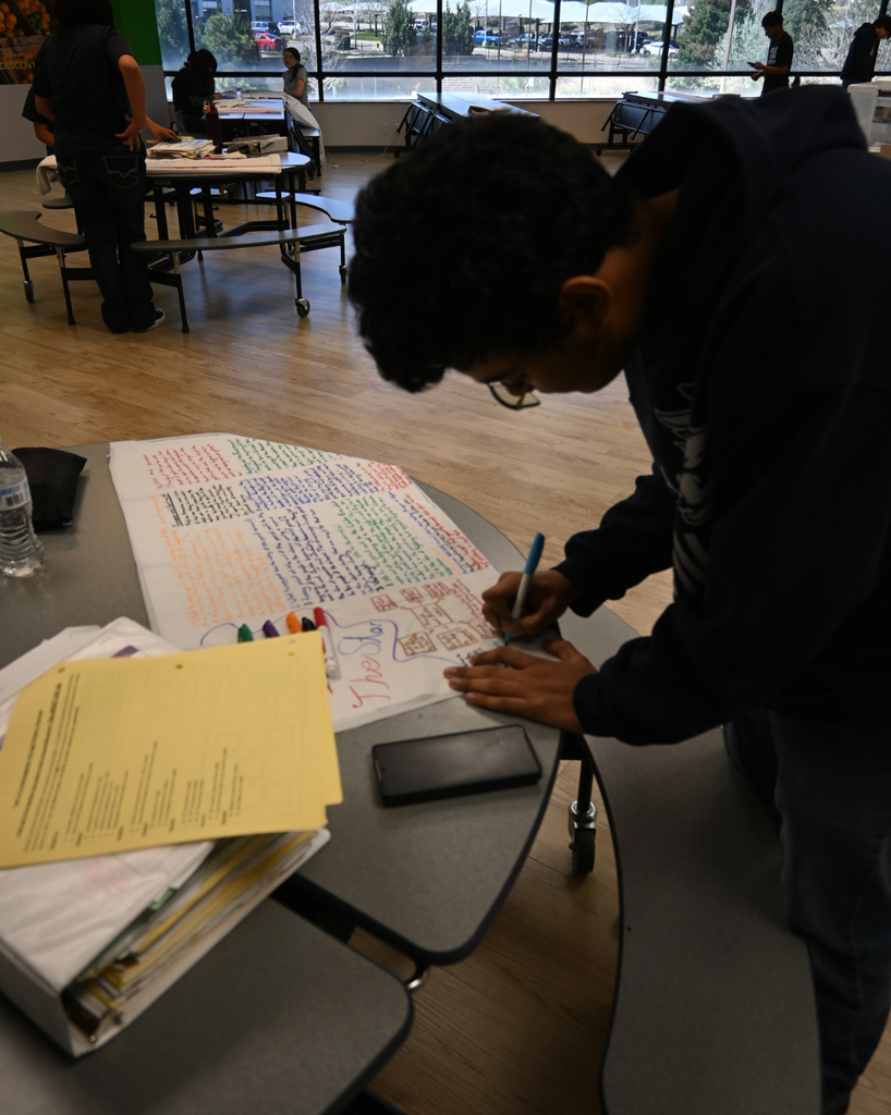 student works on shower curtain project