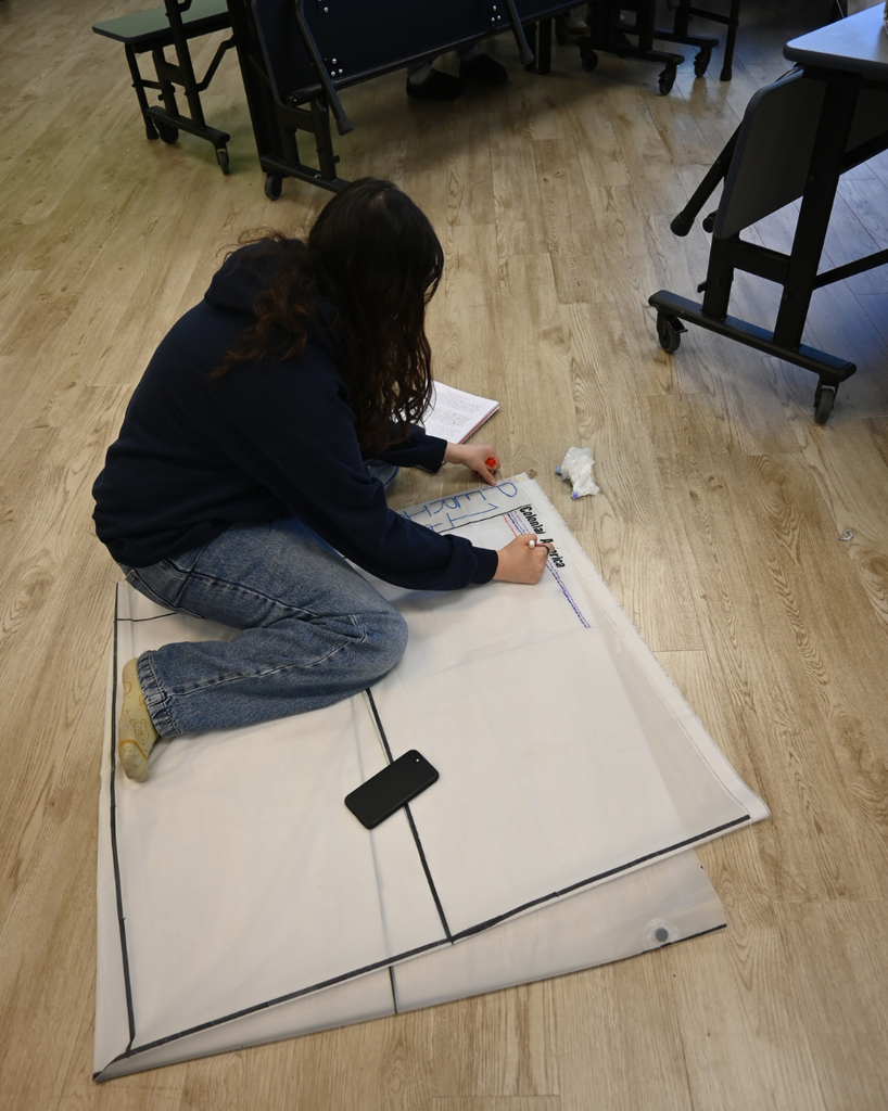 students works on shower curtain project