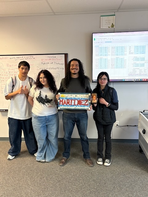 students smile with mosaics and teachers