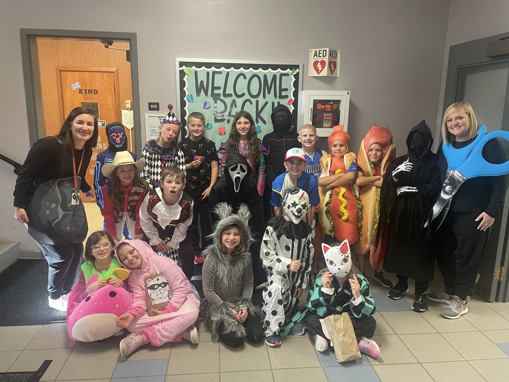 Fourth graders are pictured Thursday completing their academic escape room activity.