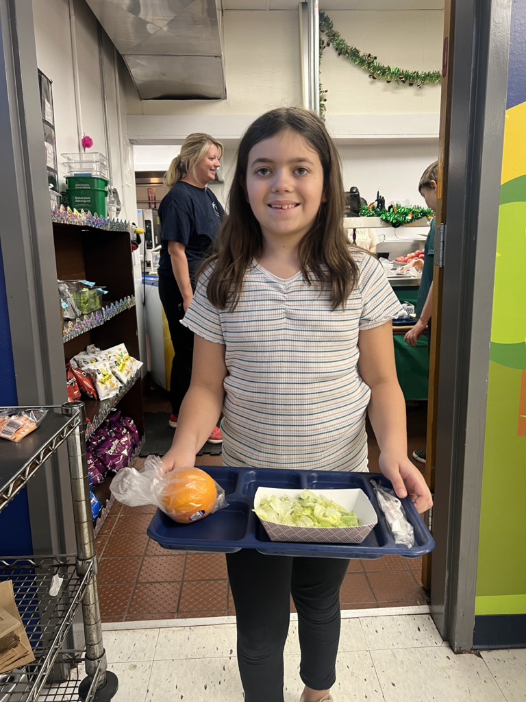 Scenes from build-a-salad plate day March 18 at Attica Elementary School.
