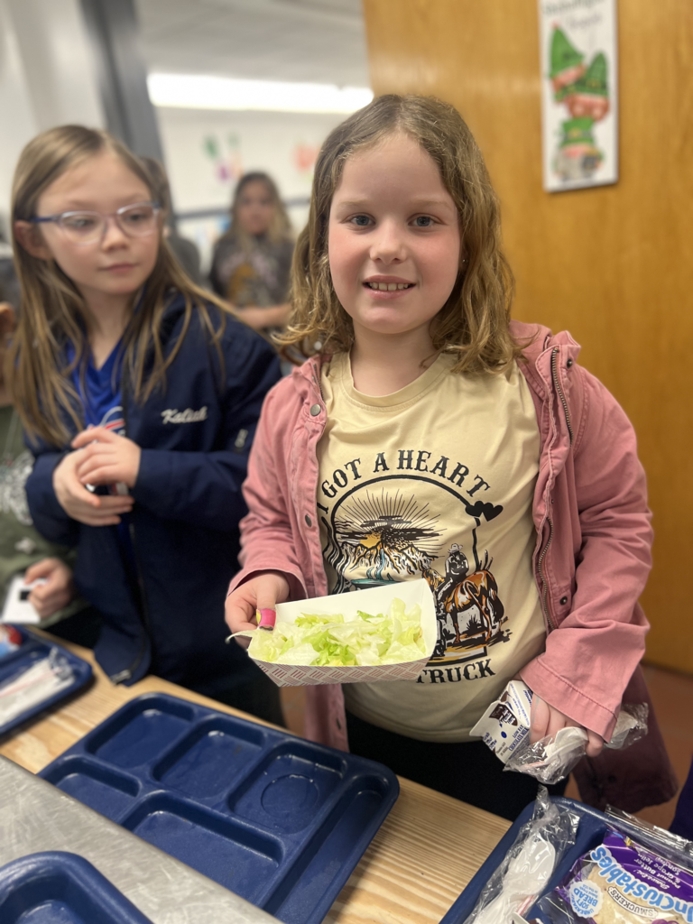 Scenes from build-a-salad plate day March 18 at Attica Elementary School.