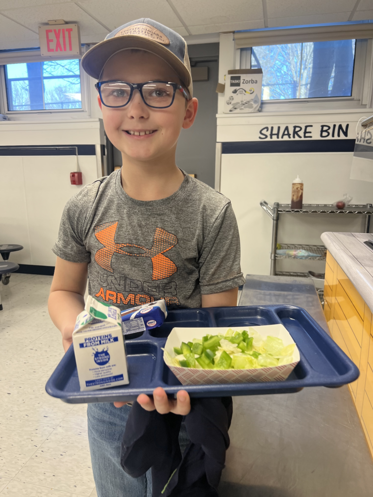 Scenes from build-a-salad plate day March 18 at Attica Elementary School.
