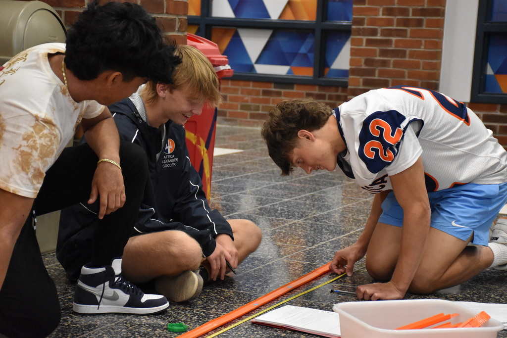 Scenes from Laura O’Donnell’s physics lesson on distance and displacement Friday afternoon. 