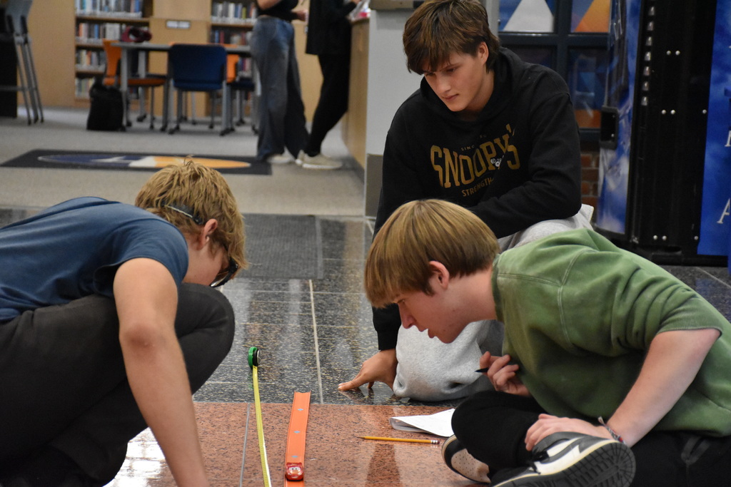 Scenes from Laura O’Donnell’s physics lesson on distance and displacement Friday afternoon. 
