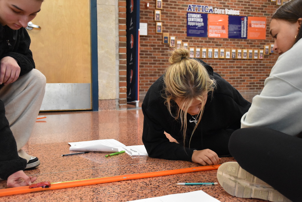 Scenes from Laura O’Donnell’s physics lesson on distance and displacement Friday afternoon. 