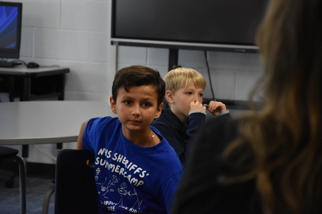 Attica Middle School students are pictured exploring the Scholastic Book Fair last week. 